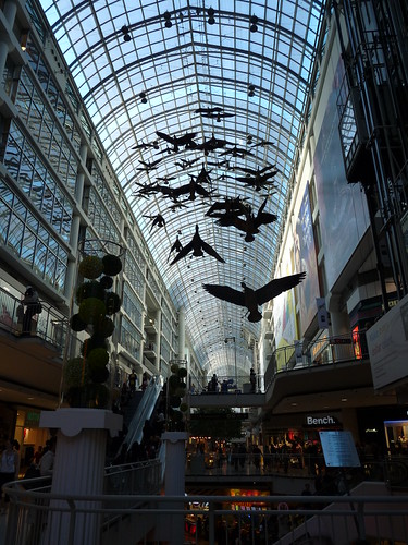 Models of geese inside a shopping arcade