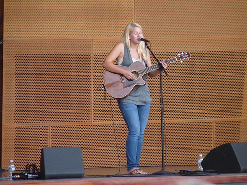 Claire Stahlecker performing on stage at the Jay Pritzer Pavilion
