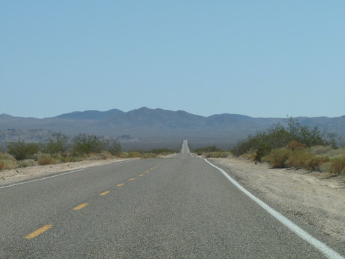 Another long straight road in the Mojave Desert