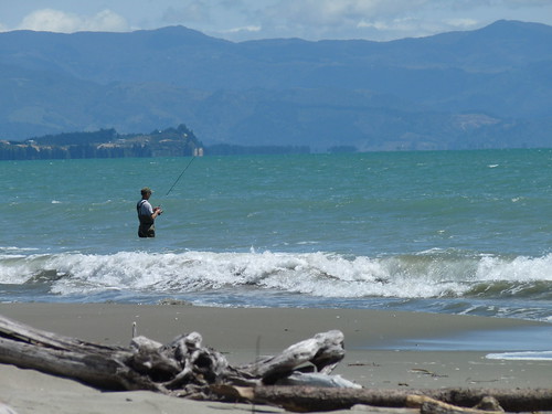 Fisherman on Rabbit Island beach