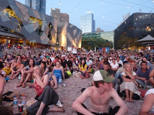 Crowds watching the tennis in Federation Square