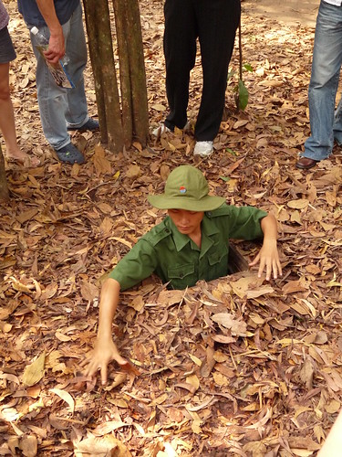 Demonstrating a Viet Cong hideaway