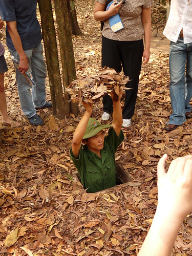 Demonstrating a Viet Cong hideaway