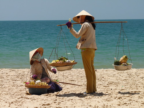Ladies selling fruit along the beach