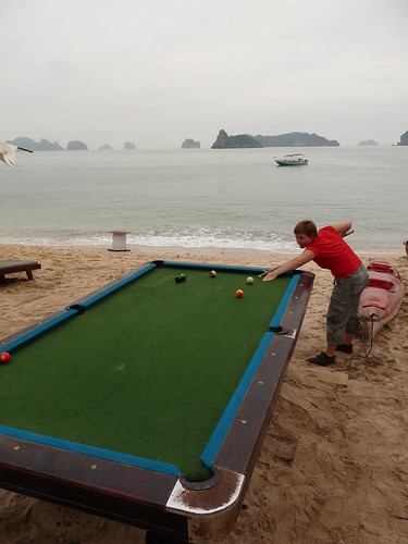 Claire playing pool on the beach on Monkey Island Resort