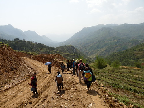 Walking to the villages, accompanied by Black H&rsquo;mong  ladies
