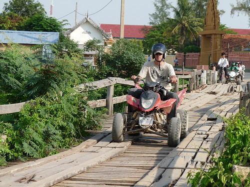 Ed crossing a rickety bridge on the quad bike tour